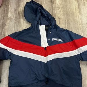 this is a patriots cropped windbreaker in XS. brand new!